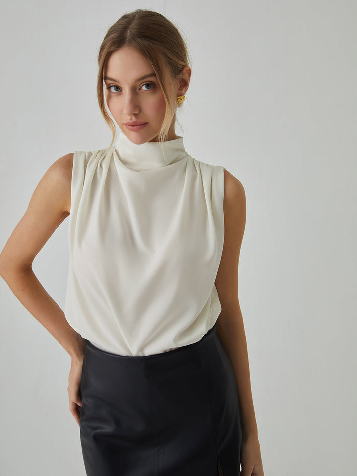 Geplooide mouwloze blouse met hoge hals